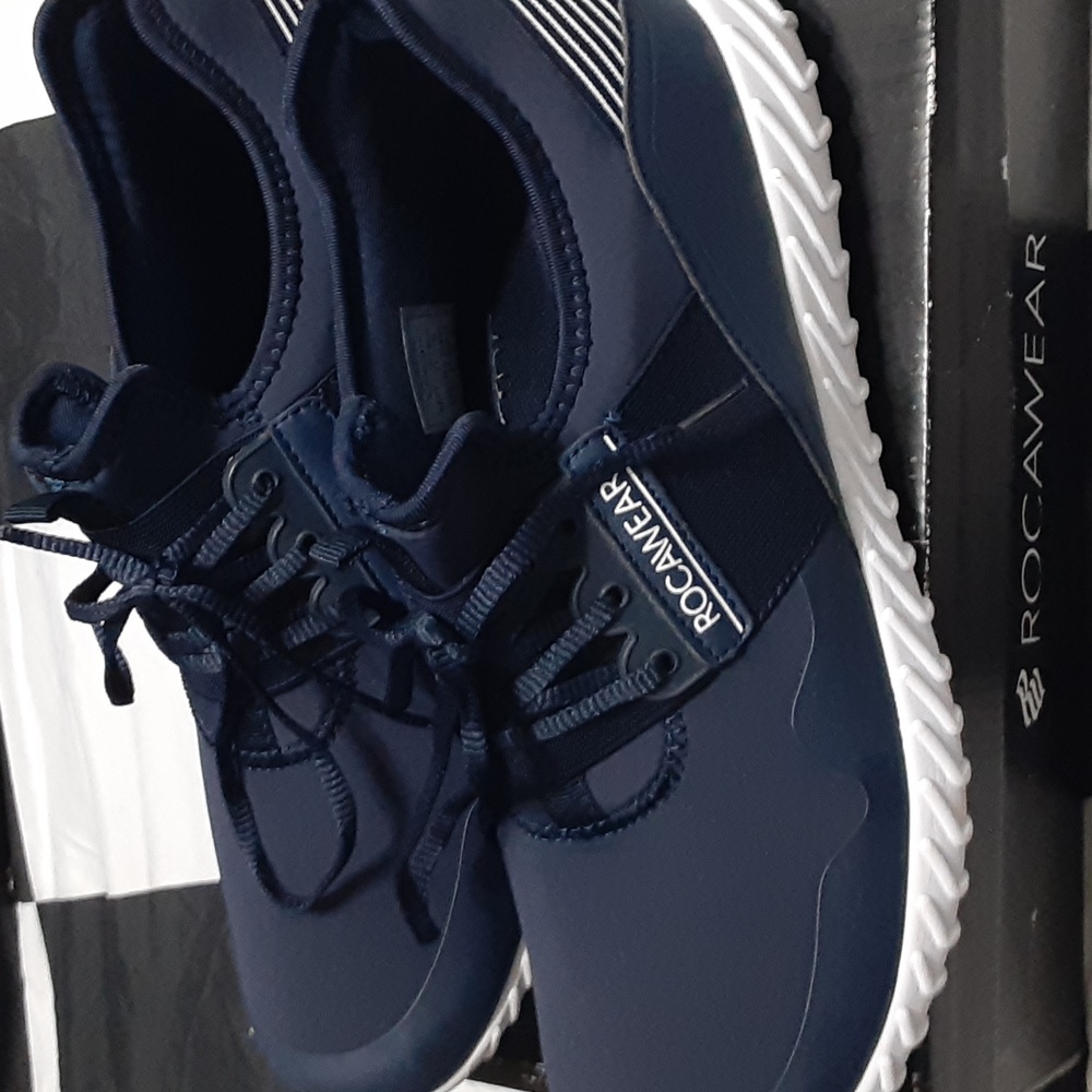 Im selling a blue pair of rocawear walking shoe there very comfortable size11 .